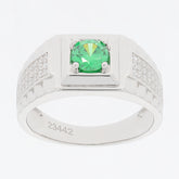 Round green emerald sterling silver ring with sparkling Moissanite accents, perfect for elegant style.